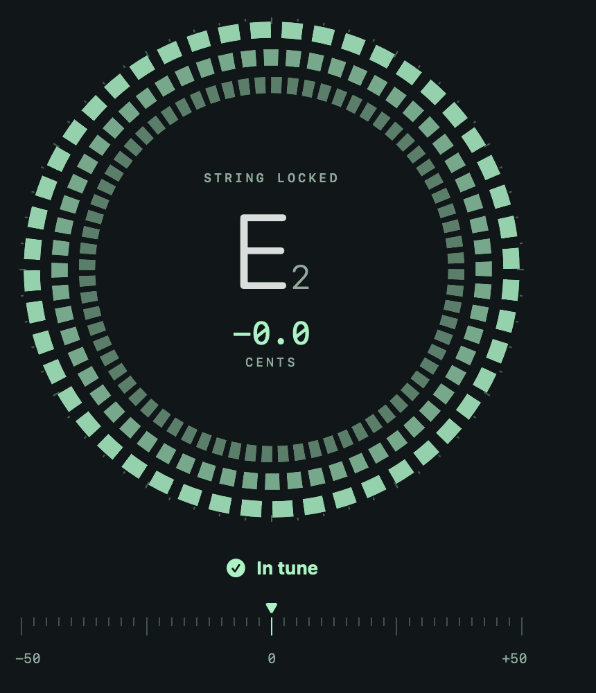 Strobe Tuner reading E2 at 0.0 cents with the marker centred and the In tune indicator lit